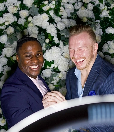 Guests using rental photo booth