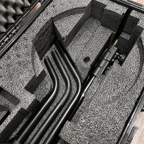 Photo of the collapsed legs placed into their slot in the case foam